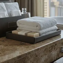 A cosa servono gli amenities hotel? Asciugamani morbidi, saponi profumati e altri dettagli per un soggiorno confortevole.