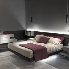 Camera da letto moderna con letto sospeso, luci soffuse e arredi minimalisti. Un vero regno del relax, la "camera queen" perfetta.