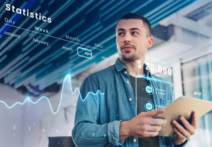 Uomo analizza dati finanziari su tablet, con grafici e statistiche che illustrano il confronto tra ERP e CRM per la gestione aziendale.