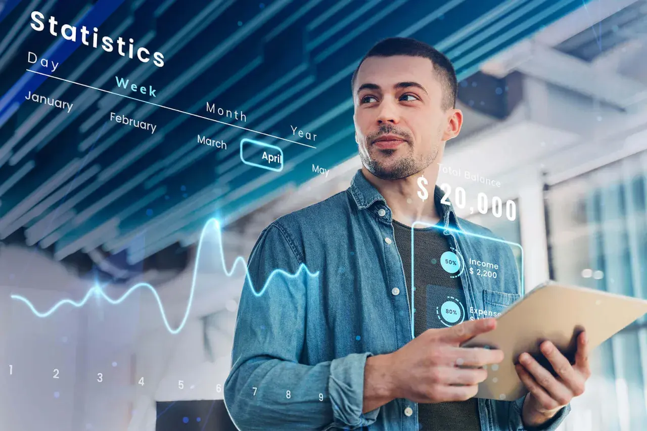 Uomo analizza dati finanziari su tablet, con grafici e statistiche che illustrano il confronto tra ERP e CRM per la gestione aziendale.